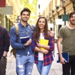 Three couples walking after school